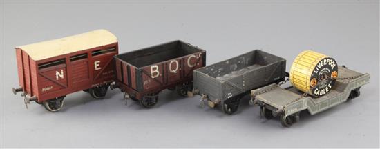 A flat wagon, no.M2016, an LMS 6 plank 12T open wagon, no.71403, an open wagon BQC, no.103 and